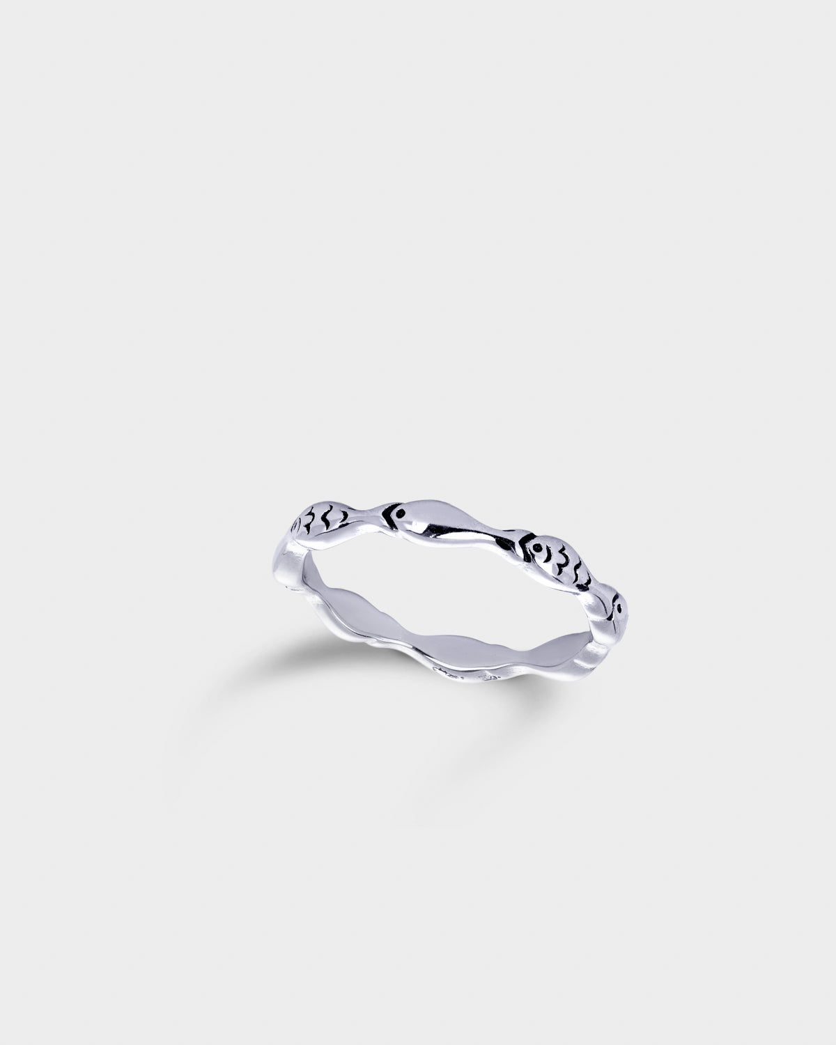 Modern slim geometric silver ring with a minimalist style and a cute fish pattern.