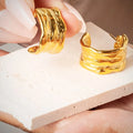 Liah_Gold_Earrings_1

Gold hoop earrings 