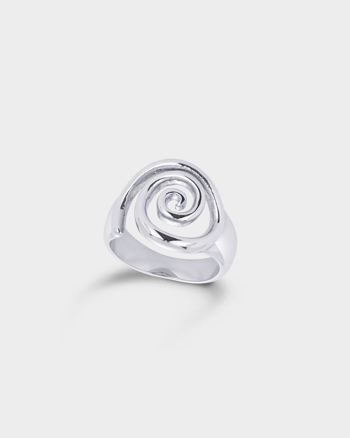 A polished silver ring featuring a sculpted spiral design
