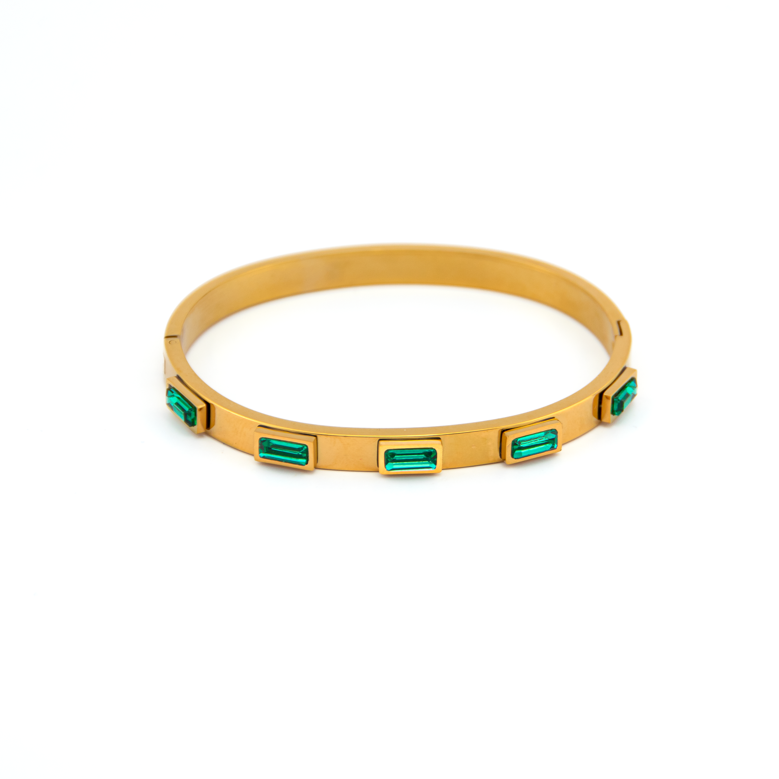 Zara_Gold_Emerald_Bracelet_2

Gold bracelet with green gemstones on a white background