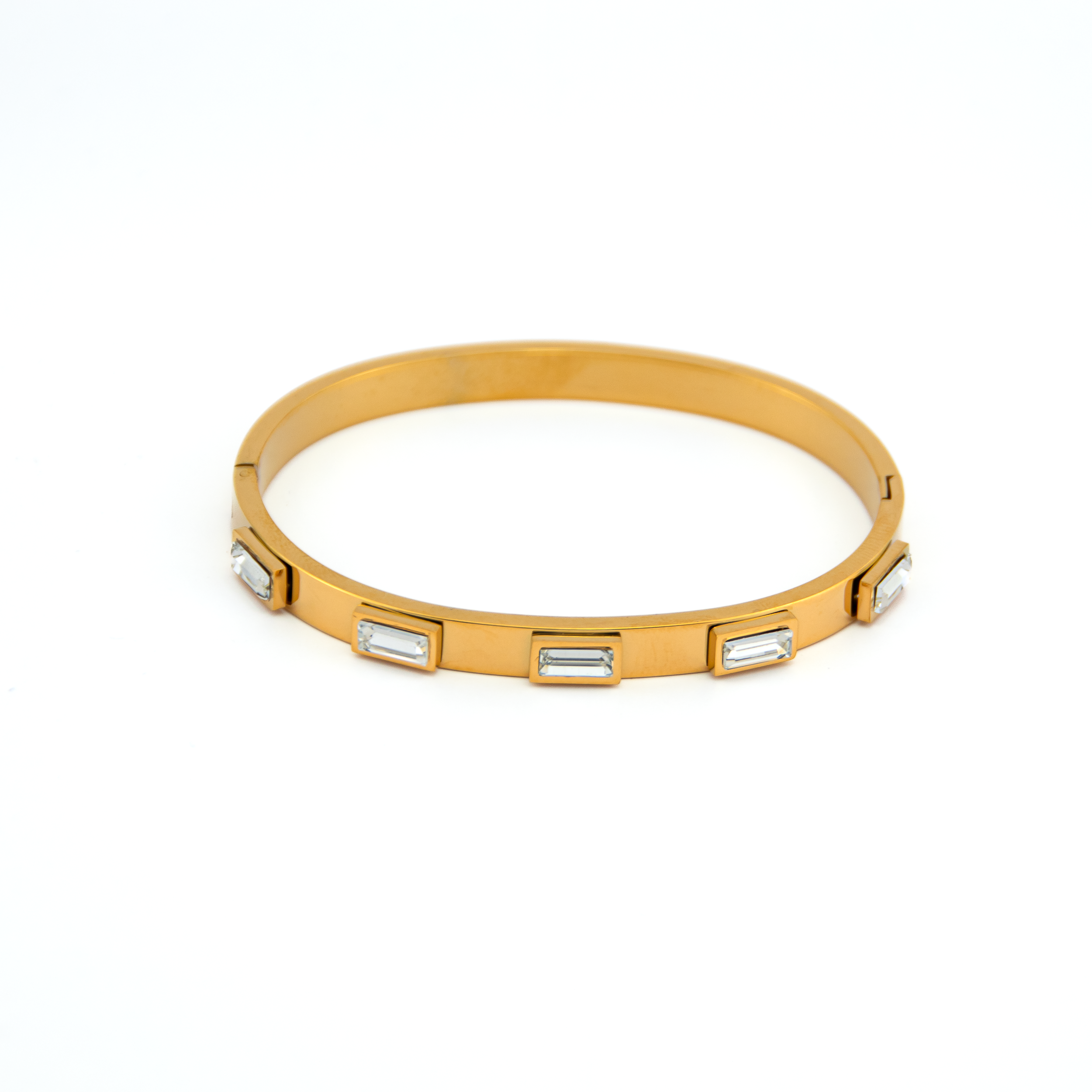 Zara_Gold_White_Bracelet_2

Gold bracelet with embedded stones on a white background